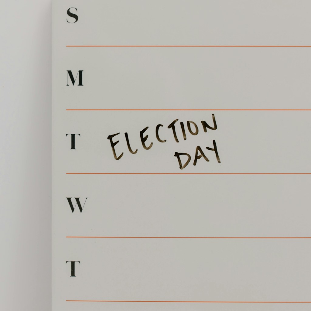 Close-up of a calendar with "Election Day" written in the space for Thursday